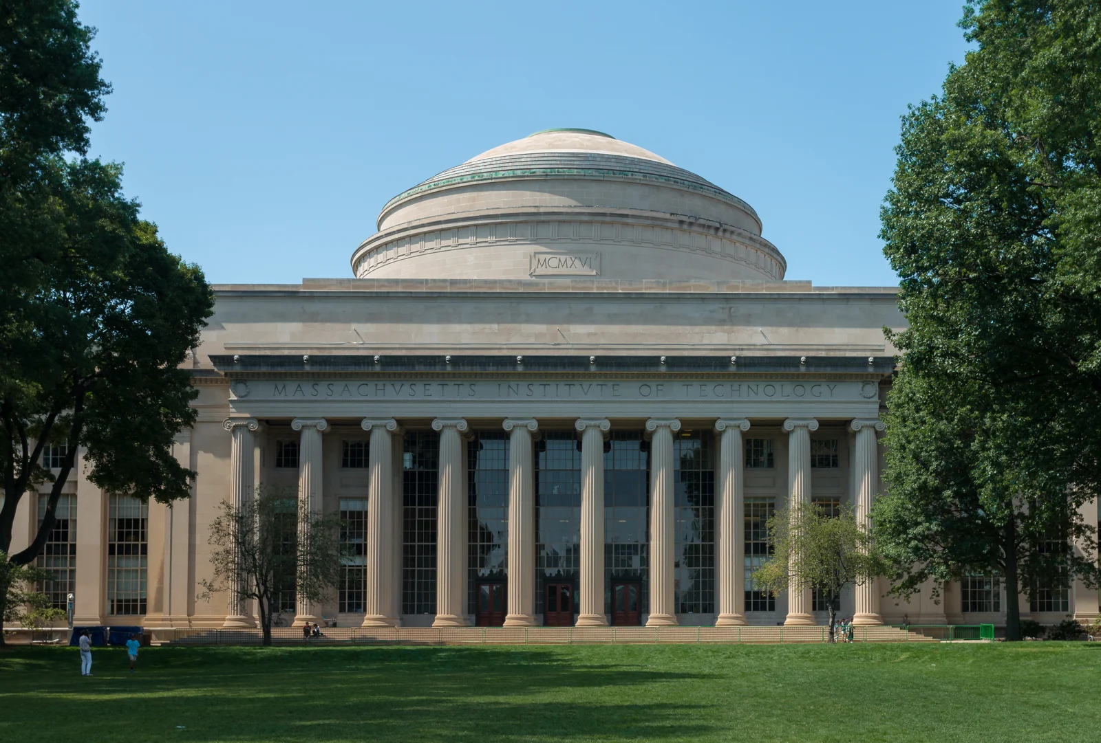 The Great Dome and columns at MIT, framed by trees